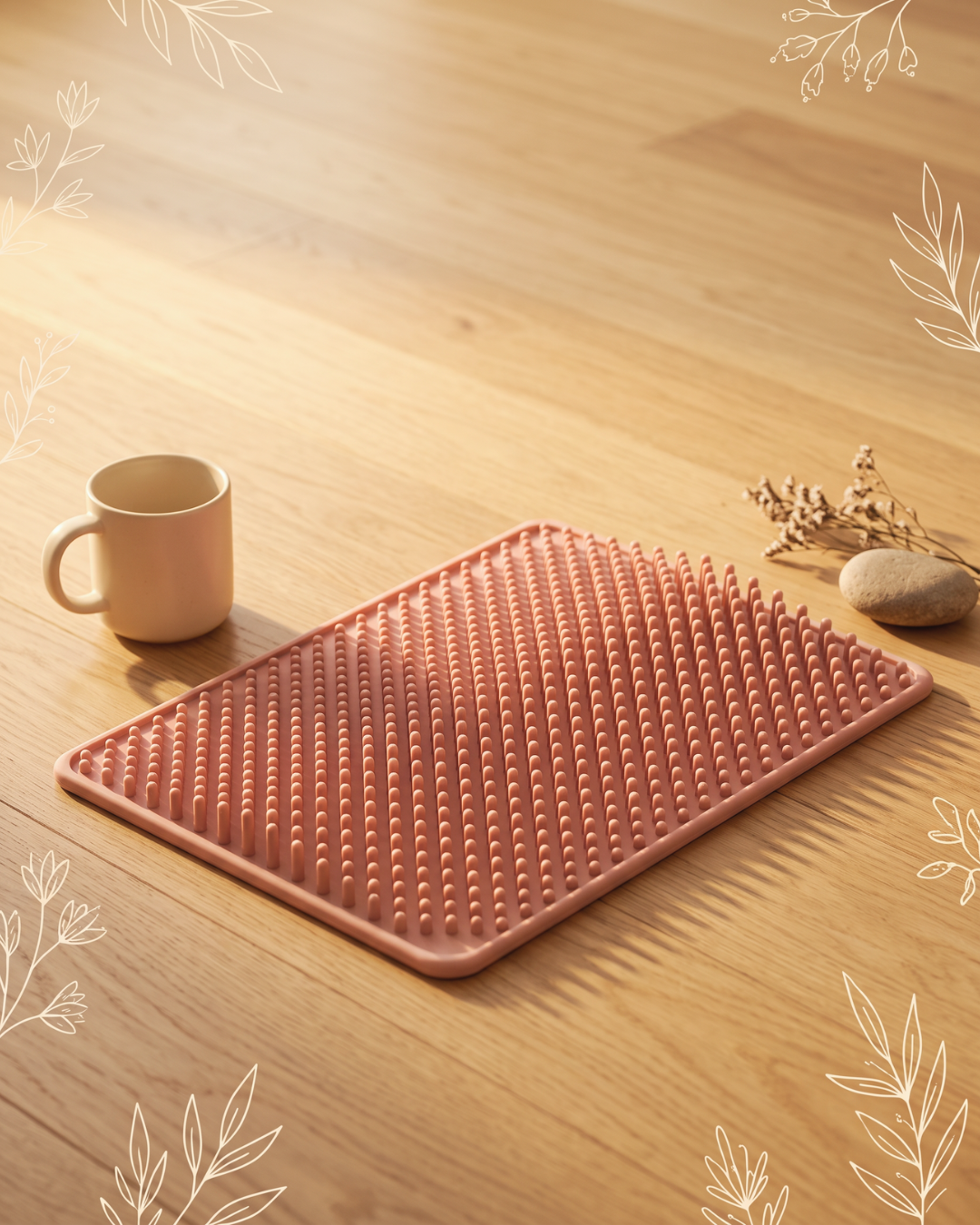 wave press pressure-point mat styled on a sunlit timber floor