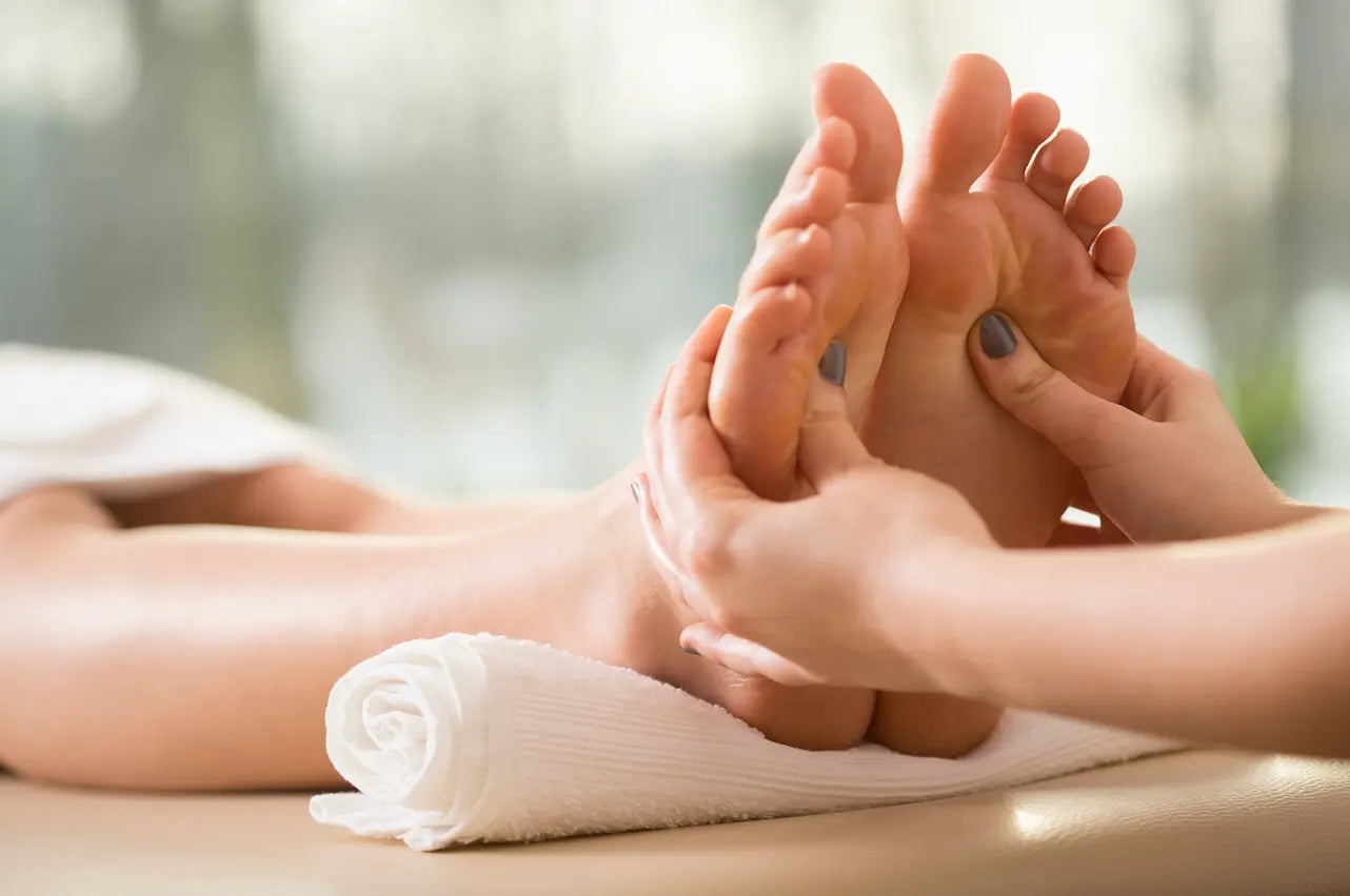 a relaxing foot massage in warm natural light